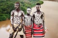 Thre young men from Karo Tribe, Omo valley Royalty Free Stock Photo