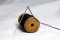 Thread bobbin and needle Royalty Free Stock Photo