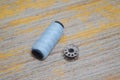 Thread reel for storing sewing thread on the inside of the sewing machine with the thread. Royalty Free Stock Photo