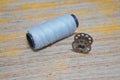 Thread reel for storing sewing thread on the inside of the sewing machine with the thread. Royalty Free Stock Photo