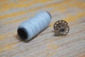 Thread reel for storing sewing thread on the inside of the sewing machine with the thread. Royalty Free Stock Photo