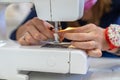 Thread replacement in a sewing machine for stapling fabric Royalty Free Stock Photo