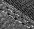 Thread seam on black leather material as background Royalty Free Stock Photo