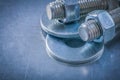 Threaded bolt washers screwbolts construction nuts on metallic b Royalty Free Stock Photo