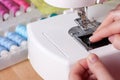 Threading a Needle in Sewing Machine Royalty Free Stock Photo
