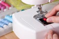 Threading a Needle in Sewing Machine Royalty Free Stock Photo