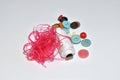 Threads, buttons and a spool of thread isolated on a white background. Royalty Free Stock Photo