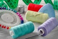 Threads colored and needle reel all for sewing Royalty Free Stock Photo