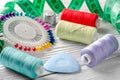 Threads colored and needle reel all for sewing Royalty Free Stock Photo
