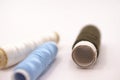 threads in different colours on white background Royalty Free Stock Photo