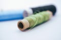 threads in different colours on white background Royalty Free Stock Photo