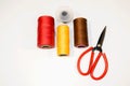 Threads and scissors top view on a white background Royalty Free Stock Photo