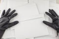 The threat in an envelope: People in protective impermeable gloves collects anonymous envelopes for checks for dangerous content,