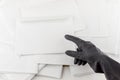 The threat in an envelope: People in protective impermeable gloves indicates an anonymous envelope to test for the presence of