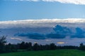 Threatening cloud formations  in the sky from the coming storm, while the blue of the sky is still visible Royalty Free Stock Photo