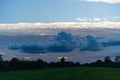 Threatening cloud formations  in the sky from the coming storm, while the blue of the sky is still visible Royalty Free Stock Photo