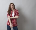 Threatening woman with male shirt expressing self-assertion
