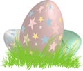 Three 3D easter eggs in a nest of grass