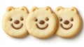 Three Adorable Bear-Shaped Cookies with Chocolate Faces, Isolated on a White Background. Royalty Free Stock Photo