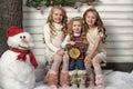 Three cute girls waiting for Christmas Royalty Free Stock Photo