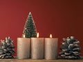 Three Advent candles burning on a red background Royalty Free Stock Photo