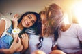 Three affectionate carefree girlfriends Royalty Free Stock Photo