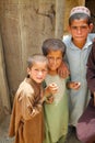 Three Afghan Kids Watch an ISAF Patrol