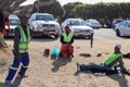 Three African car guards providing security to a parking area Royalty Free Stock Photo