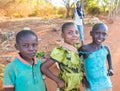 Three happy african children smiling