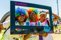 Three African girls having fun at The Color Run 5km Marathon, Br