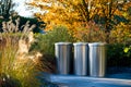 Three aluminium gargage bins standing in a garden Royalty Free Stock Photo