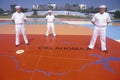 Three American Sailors Standing on Map of the United States,Sea World, San Diego, California