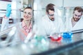 Three analytical chemists doing research in the lab Royalty Free Stock Photo