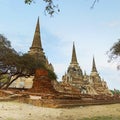 Three ancient pagodas chedies ruins of old Siam capital Ayutthaya at Wat Phra Si Sanphet temple. Thailand Royalty Free Stock Photo