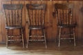 Three Antique Press Back Chairs