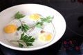 Three appetizing fried eggs in the pan