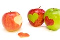 Three apples with hearts Royalty Free Stock Photo