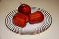 Three apples on plate Royalty Free Stock Photo