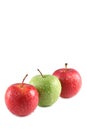 Three apples with water drops isolated on white background Royalty Free Stock Photo