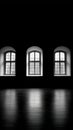 Three arched windows in a dark room with shiny wood floors, casting light reflections. Royalty Free Stock Photo