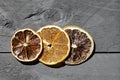 Three aromatic slices of dried citrus