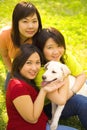 Three Asian Girls And Dog