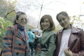 three asian woman friend holding raining umbrella happiness emotion traveling in hokkaido japan