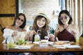 Three asian woman ready to eating western food on table Royalty Free Stock Photo