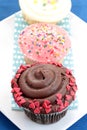 Three assorted cupcakes Royalty Free Stock Photo