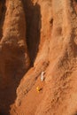 Three astronauts exploring a mars canyon, concept