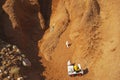 Three astronauts exploring mars with a vehicle, concept