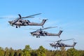 Three attack helicopters in flight