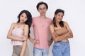 Three attractive young people - a lanky slim male flanked by two pretty ladies