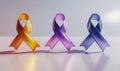 Three awareness ribbons in orange, purple, and blue on a gradient background Royalty Free Stock Photo